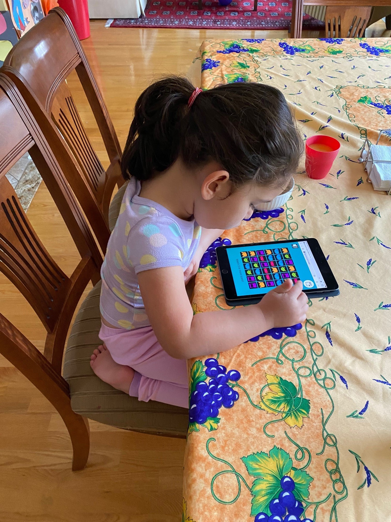 Child playing CARD game - image 2